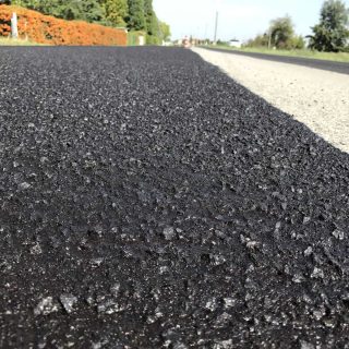 Road surface dressing via micro-surface paving - Slurry Srl