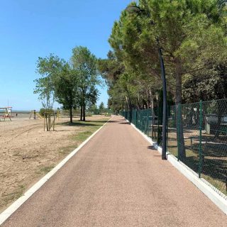 Grado - triple layer green asphalt cycle path - Slurry Srl