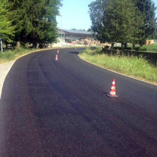 Slurry sealing a dangerous bend for road safety - Slurry Srl