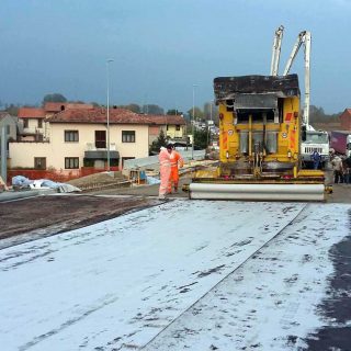 Laying waterproofing geotextile on a bridge - Slurry Srl